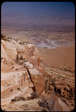 View down across buttes and Colorado river valley from heights of Colorado Nat'l Mon.