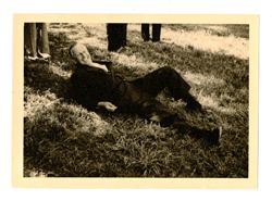 Man lying in grass
