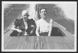 Hoagy Carmichael and Ruth Carmichael in a motorboat.