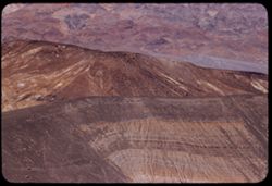 Top rim of Ubehebe Crater and mountains beyond Death Valley