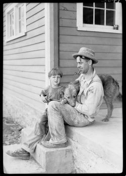 Father, son and dog, at Greensboro mill