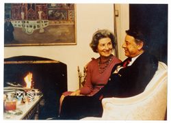 Coughlan couple in home by fireplace