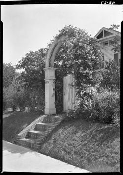 Entrance to home, rose archway, Indpls, N. Ill.