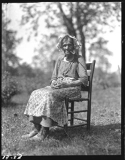 Jane Foster, seated