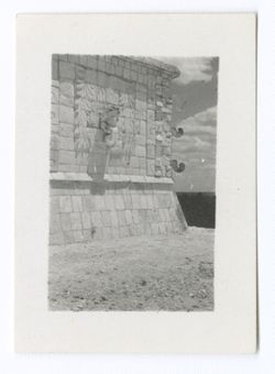 Item 0775. - 0779. Medium shots of figure on outer wall of upper temple of the Temple of the Warriors.