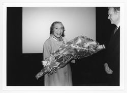 Elisabeth Welch holding bouquet beside unidentified man