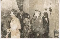 Guests mingle during a formal reception