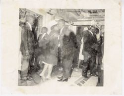 President William V. S. Tubman greets guest at an event
