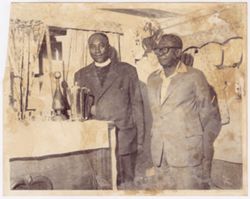 President William V. S. Tubman poses with a clergyman