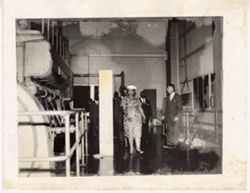 Woman walks inside warehouse