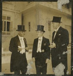 Secretary of the Treasury William E. Dennis, Sr. with Harvey S. Firestone, Jr. ourside the Executive Mansion during President Tubman's 1952 Inauguration