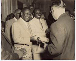 President William V. S. Tubman recieves scroll from dignitary