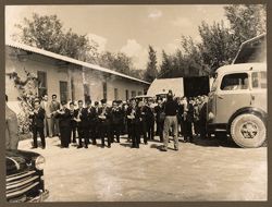 A band marches outdoors