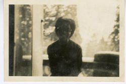 Wilhelmina "Coocoo" Tubman seated at window