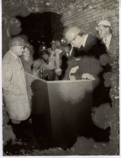 President William V. S. Tubman takes tour of construction site with group