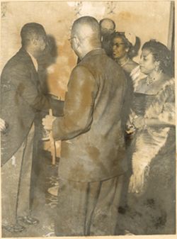 Minister Peal greeting President William V. S. Tubman, Mrs. Tubman and Mrs. Tolbert