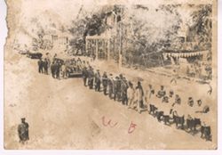 Procession of students and officials in streets of Monrovia