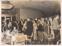 Guests at formal party mingle