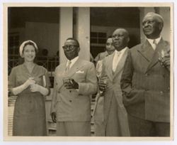 President William V. S. Tubman and others pose together with drinks in hand