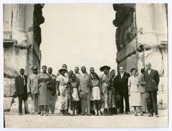 President William V. S. Tubman and Mrs. Tubman stand with large group on tour at the Roman Forums