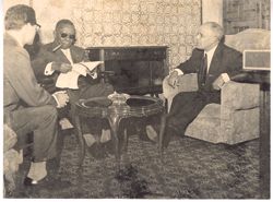 President Tubman looking over papers