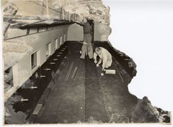 Men working on new interior of an airplane
