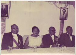 President Tubman and guests seated at table