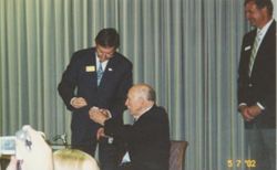 IU Ring Ceremony May 7, 2002 Chancellor Fulton assists Art Vivian with IU ring 001