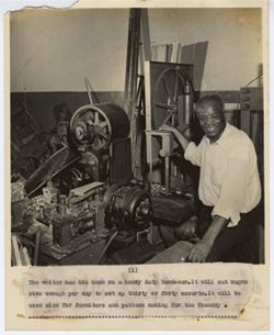 Man poses for portrait with heavy duty band saw