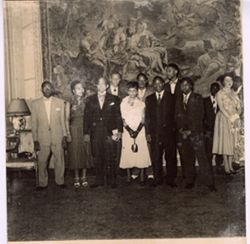 Ambassador and Mrs. Knight pose with students in Paris