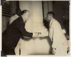 President William V. S. Tubman shakes guests hand during reception