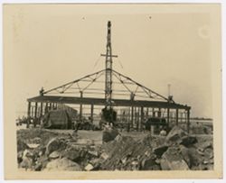 Crane constructs a building