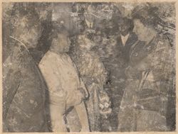 The Queen chatting with two Liberian students