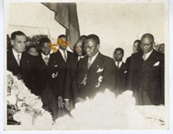 President William V. S. Tubman  shares silent moment with mourners at funeral