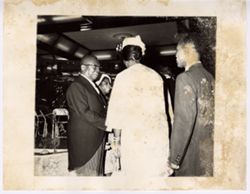 President William V. S. Tubman shakes hands with group in receiving line