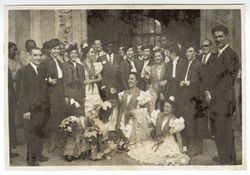 President Tubman stands with dignitaries and dancers in or near Sevilla, Spain