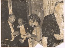 Guests at formal party mingle