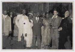 President and Mrs. Tubman on a tour guided by a clergyman with other dignitaries