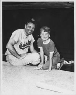Hamilton and Doug in baseball dugout