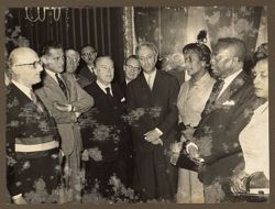 President William V. S. Tubman having a discussion with Dr. Amedeo Peyron and other dignitaries