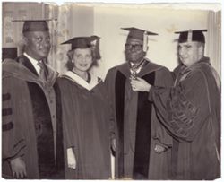 President William V. S. Tubman poses with scholars
