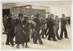 Mrs. Tubman smiles at member of her entourage