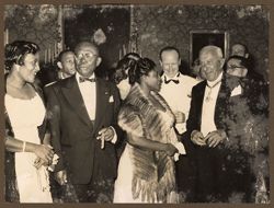 President and Mrs. Tubman with dignitaries at a reception