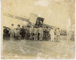 President William V. S. Tubman gathers with officials in front of the EL-AAB airplane