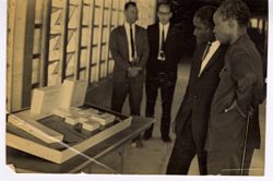 Julius Kambarage Nyerere examines a building model