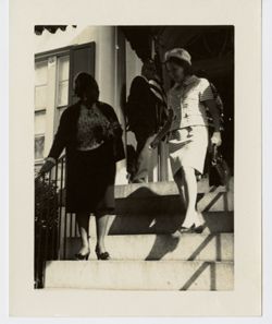 Women leaving building at capital