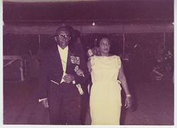A formally attired President and Mrs. Tubman pose for portrait