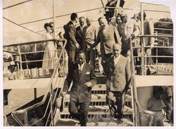President William V. S. Tubman and dignitaries walk down steps together