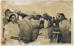 President and Mrs. Tubman and others visitors at the book stall