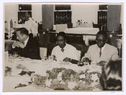President William V. S. Tubman and other dignitaries seated for formal meal
